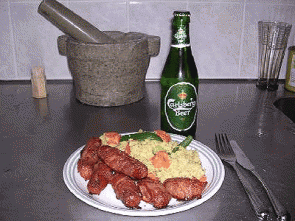 Колбаски в беконе с крупой кускус
